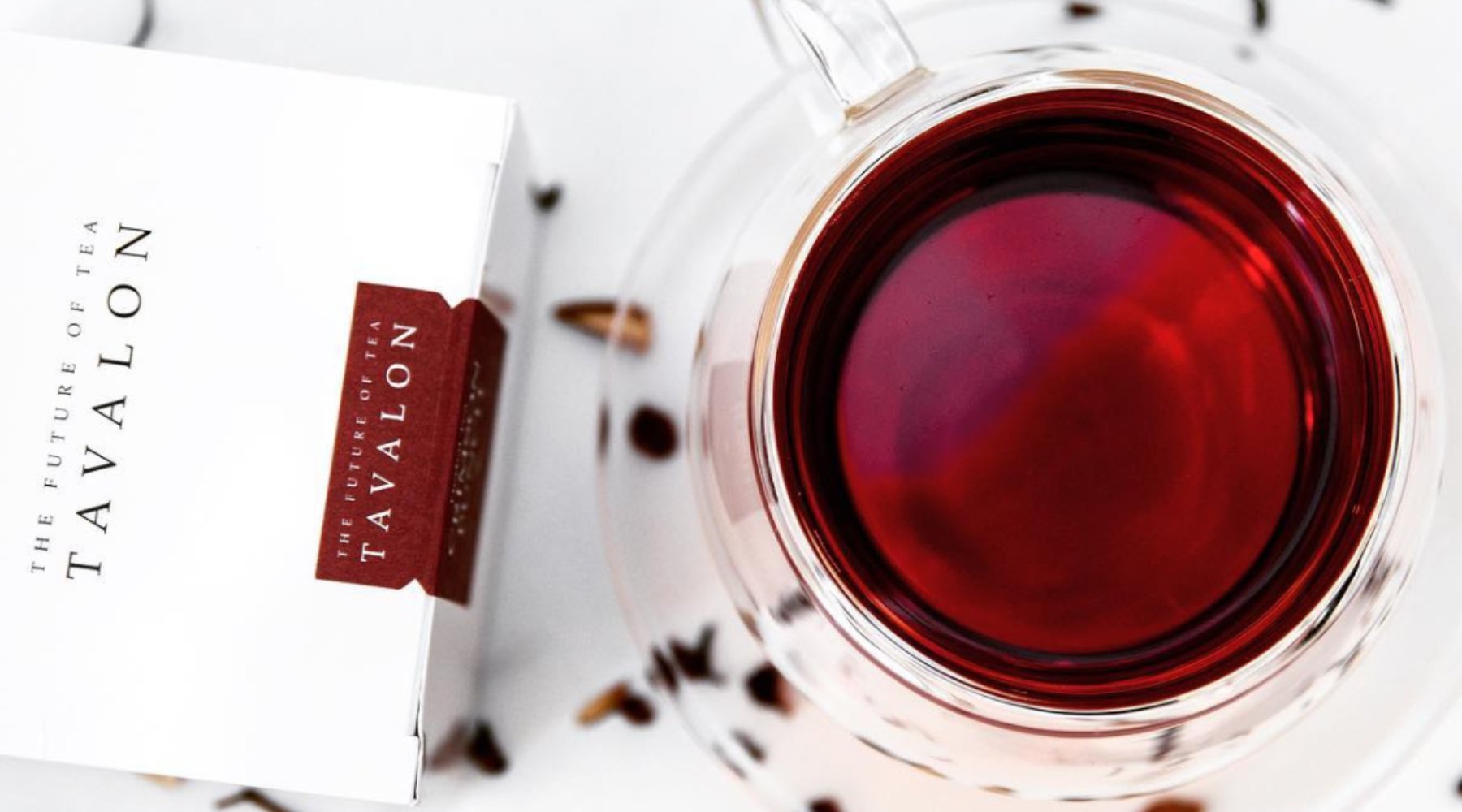 Tavalon Black Loose Leaf Tea in a Cup and the Package | Tavalon Tea Australia & New Zealand